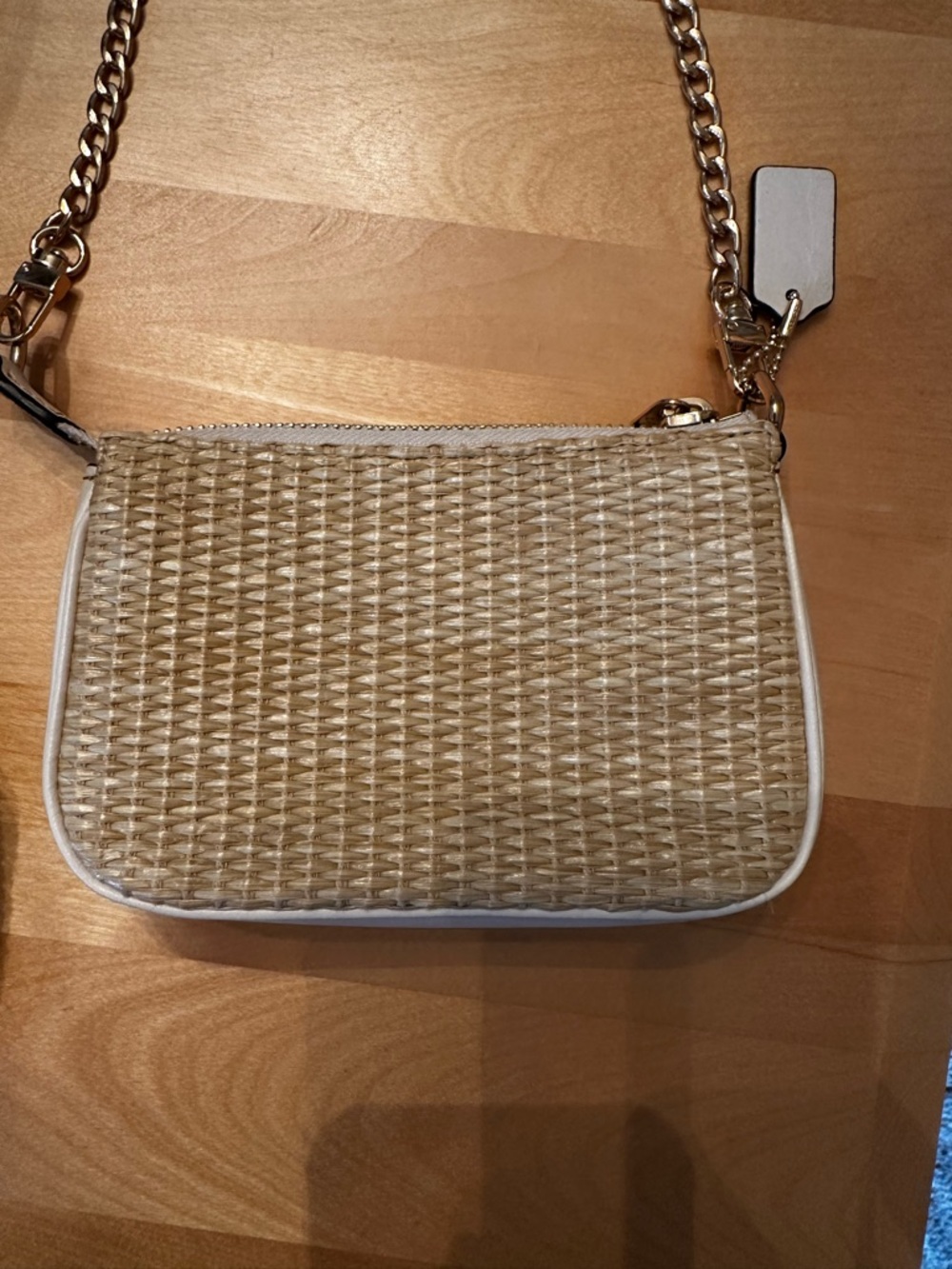 Coach Woven Straw bagwith Gold Chain Strap - White Trim. Size is 4 by 6